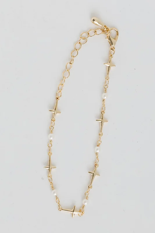 Seasonal Jewelry Clearance – Best Styles At The Lowest Prices Charlotte Gold Cross + Pearl Chain Bracelet Seasonal Jewelry Clearance – Best Styles At The Lowest Prices Charlotte Gold Cross + Pearl Chain Bracelet