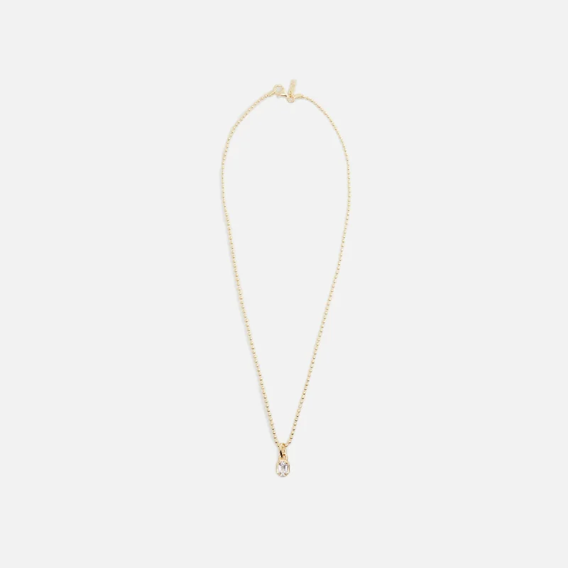 Discounted Luxury Jewelry – Shine Without The Splurge Hatton Labs Mini Emblem Pendant 18K Gold Plated - Gold Discounted Luxury Jewelry – Shine Without The Splurge Hatton Labs Mini Emblem Pendant 18K Gold Plated - Gold