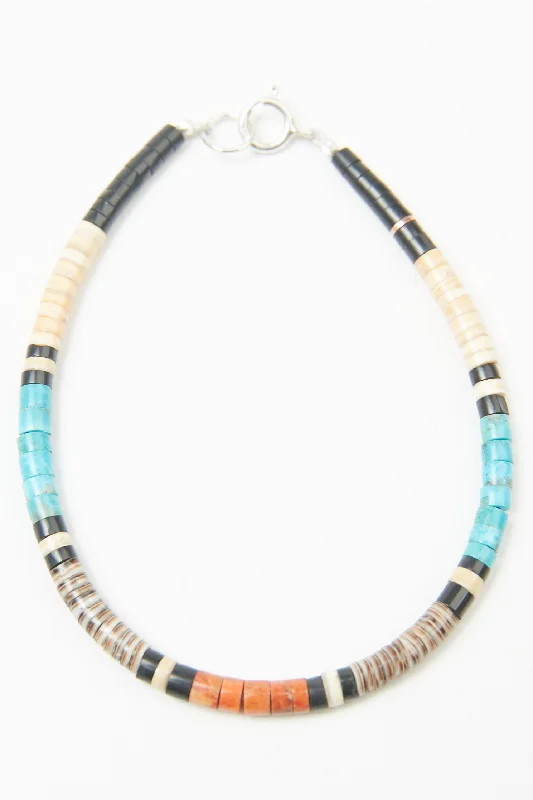 Bohemian-Inspired Jewelry For Free-Spirited Fashion Multicolor Heishi Bracelet by Gerard & Mary Calabaza - Brown: Baby Olive Shell - Mediterranean Sea Bohemian-Inspired Jewelry For Free-Spirited Fashion Multicolor Heishi Bracelet by Gerard & Mary Calabaza - Brown: Baby Olive Shell - Mediterranean Sea