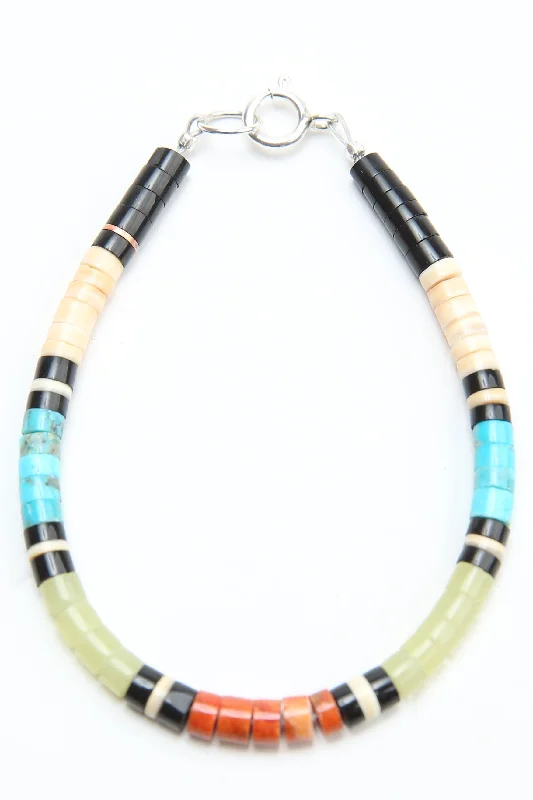 High-Quality Gemstone Jewelry For Special Occasions Multicolor Heishi Bracelet by Gerard & Mary Calabaza - Yellow Clear Serpentine - Socorro, NM High-Quality Gemstone Jewelry For Special Occasions Multicolor Heishi Bracelet by Gerard & Mary Calabaza - Yellow Clear Serpentine - Socorro, NM