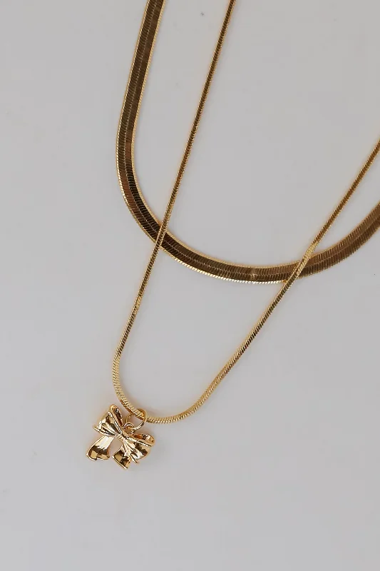 Elegant Jewelry, Exclusive Prices – Shop Now Skylar Gold Bow Charm Layered Snake Chain Necklace