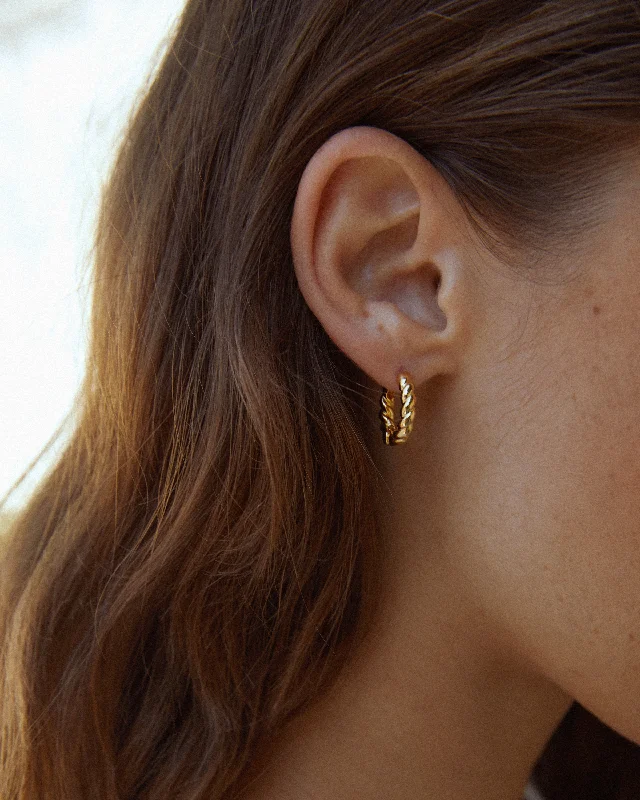 Shop Jewelry That Shines Without The High Price Small Twisted Hoop Earrings