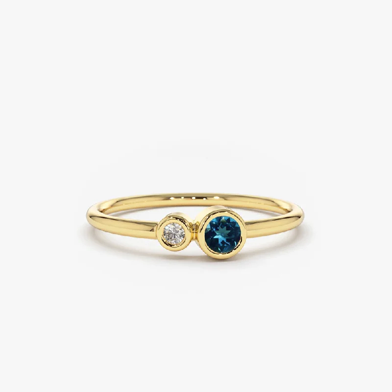 Premium Diamond Jewelry At Once-In-A-Lifetime Discounts 14K Gold Bezel Setting London Blue Topaz and Diamond Ring Premium Diamond Jewelry At Once-In-A-Lifetime Discounts 14K Gold Bezel Setting London Blue Topaz and Diamond Ring