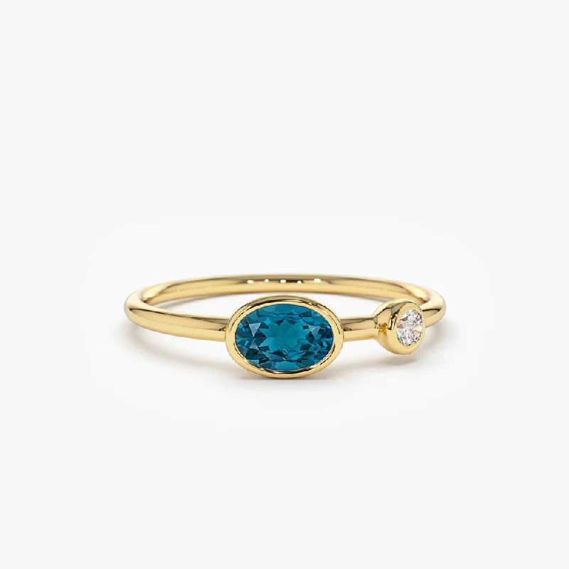 Dazzle In Elegance With Our Biggest Jewelry Sale 14k Gold Oval London Blue Topaz and Diamond Ring Dazzle In Elegance With Our Biggest Jewelry Sale 14k Gold Oval London Blue Topaz and Diamond Ring