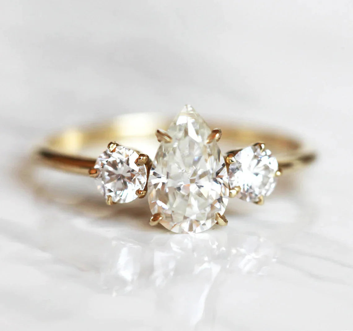 Make Every Moment Shine – Jewelry Discounts Available Alisa Pear Moissanite Ring