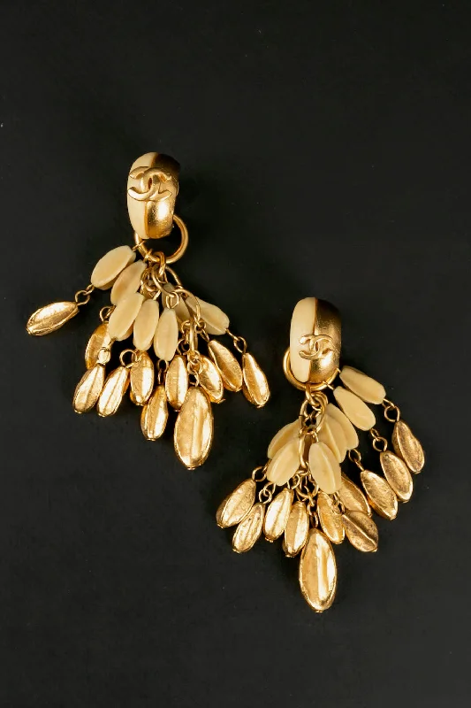 Boucles d'oreilles dorées Chanel