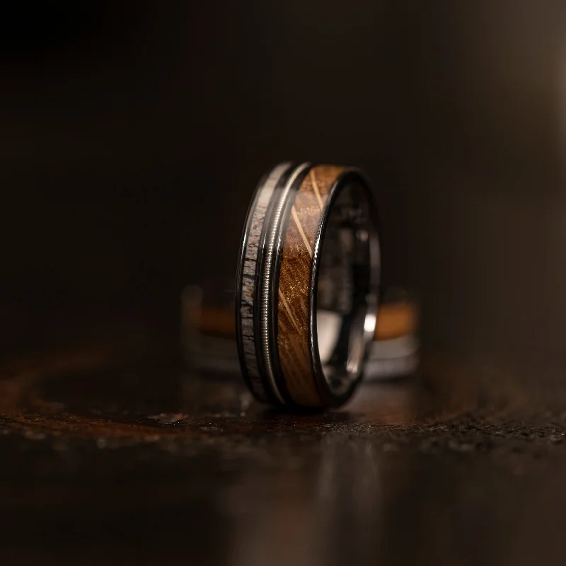 Don't Miss Out – Shop Elegant Jewelry For Less "Dionysus" Whiskey Barrel Wood x Antler x Guitar String Ring- Gunmetal Tungsten Don't Miss Out – Shop Elegant Jewelry For Less "Dionysus" Whiskey Barrel Wood x Antler x Guitar String Ring- Gunmetal Tungsten