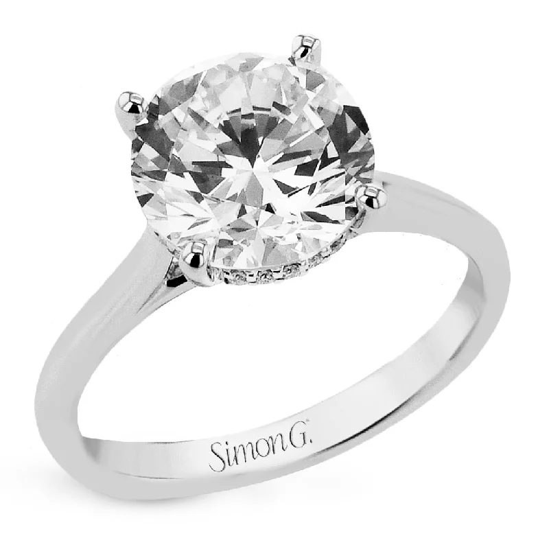 Shine Bright With Our Special Jewelry Promotions Round-cut Hidden Halo Engagement Ring in 18k Gold with Diamonds Shine Bright With Our Special Jewelry Promotions Round-cut Hidden Halo Engagement Ring in 18k Gold with Diamonds