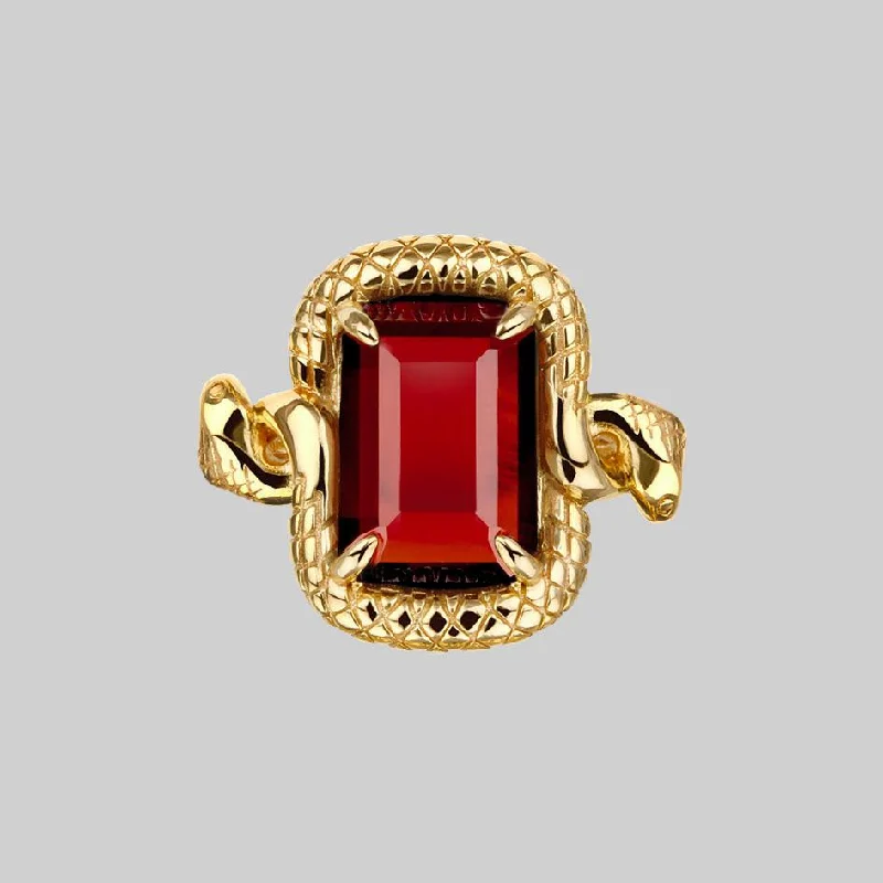 Breathtaking Jewelry, Breathtaking Prices MALICE. Garnet CZ Coiled Snake Cocktail Ring - Gold Breathtaking Jewelry, Breathtaking Prices MALICE. Garnet CZ Coiled Snake Cocktail Ring - Gold