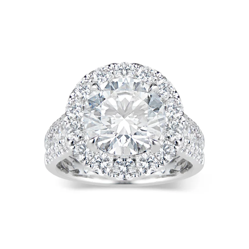 Shop Signature Jewelry Styles At Exclusive Prices Round Diamond Halo Engagement Ring with Pave Diamond Shank Shop Signature Jewelry Styles At Exclusive Prices Round Diamond Halo Engagement Ring with Pave Diamond Shank