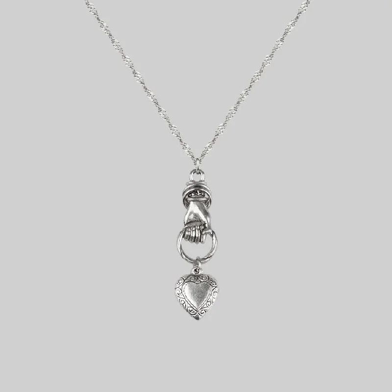 Jewelry Clearance Sale – Final Reductions ALL OF ME. Hand Grasping Heart Necklace - Silver Jewelry Clearance Sale – Final Reductions ALL OF ME. Hand Grasping Heart Necklace - Silver