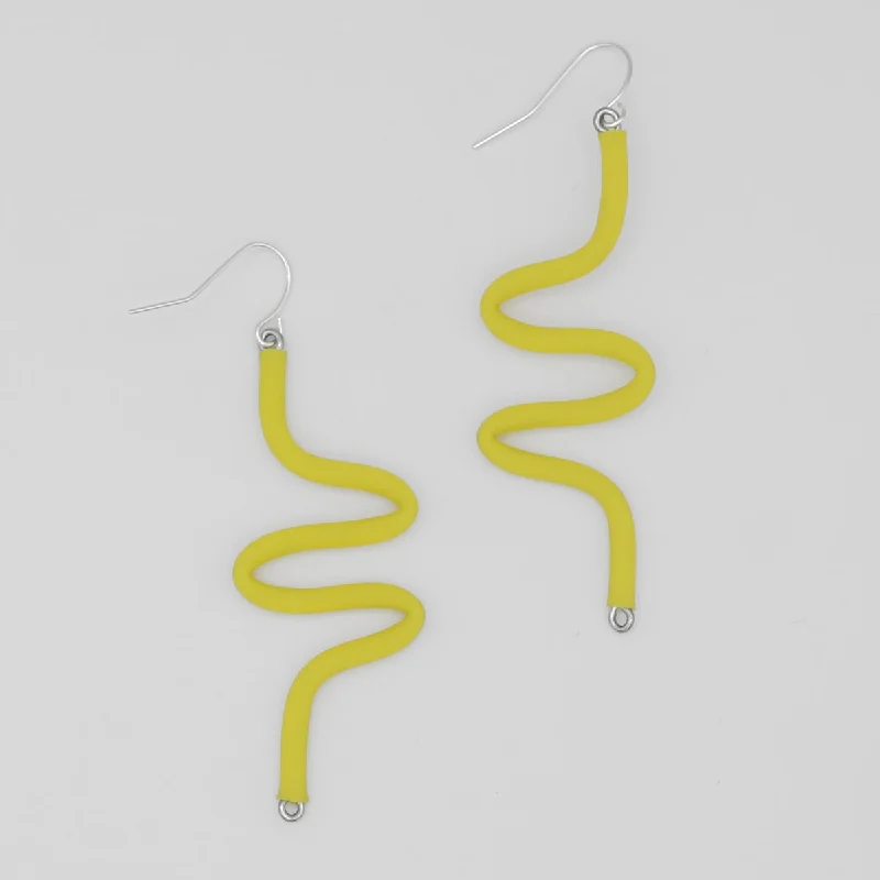 Elevate Your Outfit With Discounted Statement Jewelry Artistic Rubber Tubing Naya Earrings Yellow