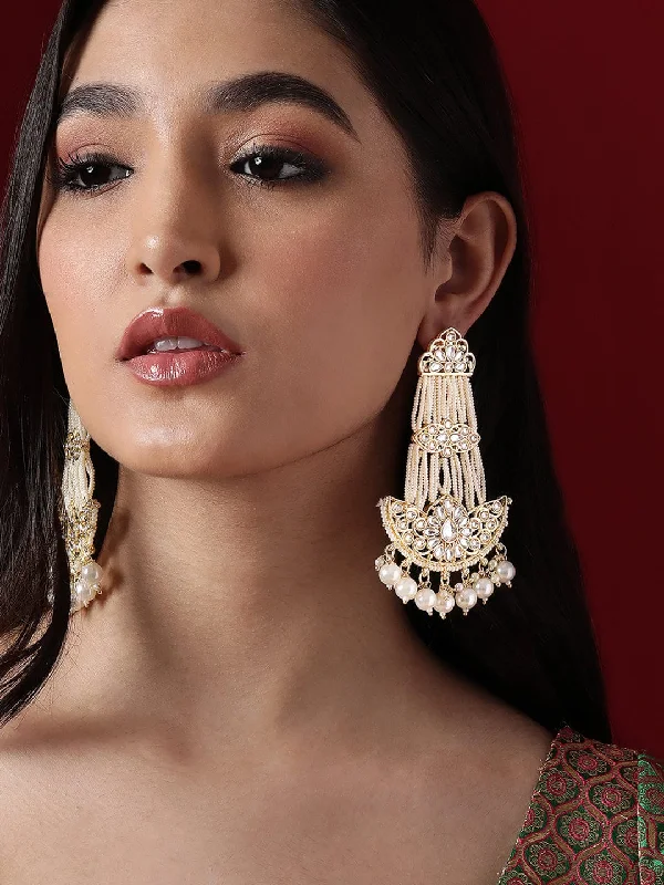 The Perfect Jewelry Piece At The Perfect Price Rubans Gold Plated Classic Kundan Chandbali With White Beads. The Perfect Jewelry Piece At The Perfect Price Rubans Gold Plated Classic Kundan Chandbali With White Beads.