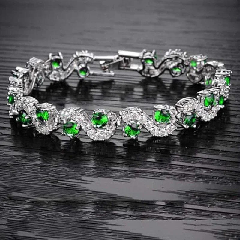 Limited Stock On Premium Jewelry At Low Prices Mahi Rhodium Plated Green and White Crystals Studded Kada / Bracelet for Women (BR1101046RGre) Limited Stock On Premium Jewelry At Low Prices Mahi Rhodium Plated Green and White Crystals Studded Kada / Bracelet for Women (BR1101046RGre)