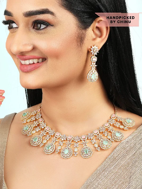 Sparkle In Style With Our Best Jewelry Deals Rubans Gold Plated Handcrafted Pink & Green AD Studded Necklace Set. Sparkle In Style With Our Best Jewelry Deals Rubans Gold Plated Handcrafted Pink & Green AD Studded Necklace Set.