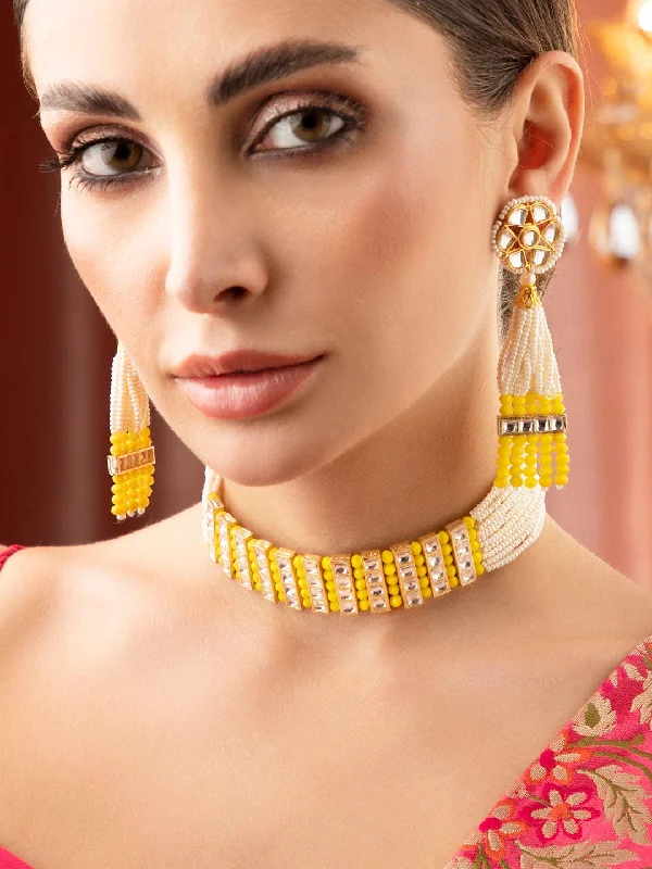 Premium Jewelry Now Available At Special Discounts Rubans Gold Plated Kundan Choker Set With White And Yellow Beads Premium Jewelry Now Available At Special Discounts Rubans Gold Plated Kundan Choker Set With White And Yellow Beads